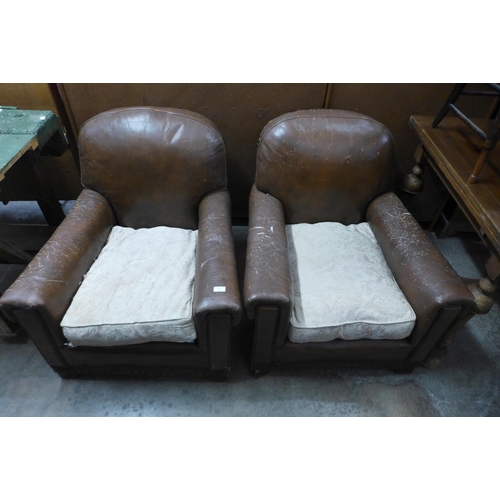 222 - A pair of Art Deco brown leather armchairs