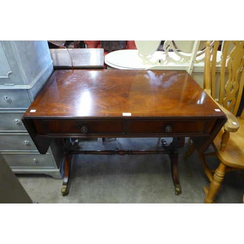 234 - An inlaid mahogany drop leaf sofa table