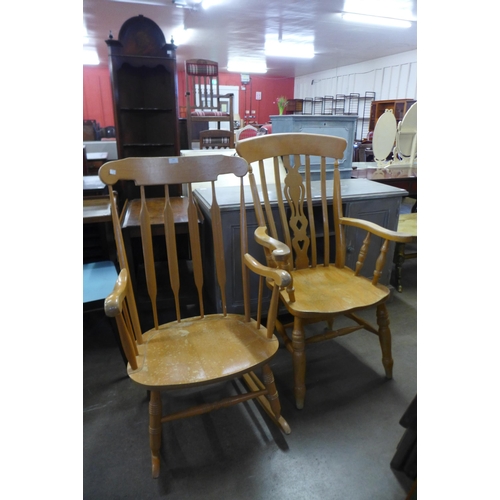 236 - A beech farmhouse rocking chair and an armchair