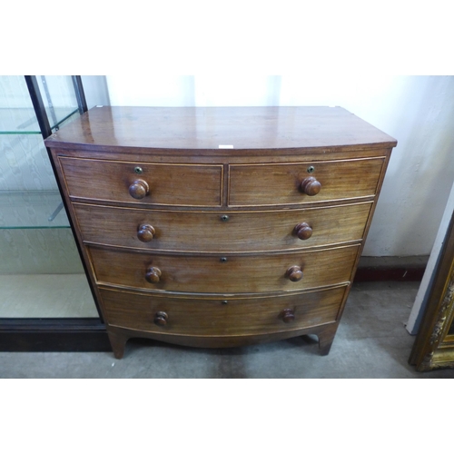 241 - An early 19th century mahogany bow front chest of drawers