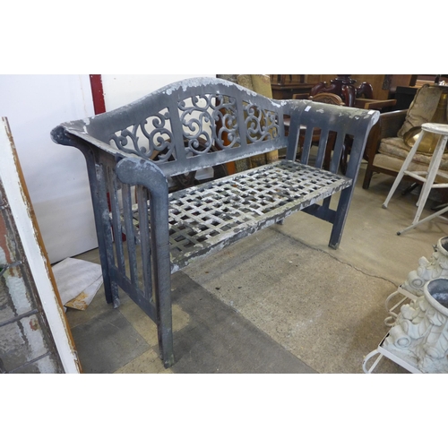 253 - A cast alloy garden bench