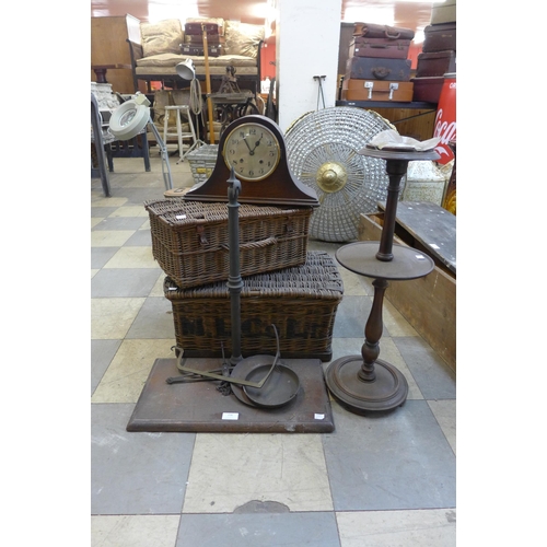 258 - Two wicker baskets, an oak mantel clock, a smokers stand and a set of weighing scales