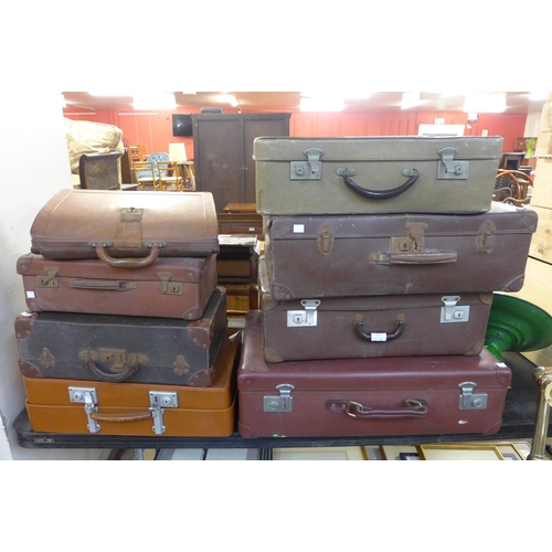 267 - Seven vintage cases and a brown leather bag