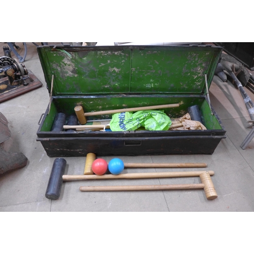 279 - A beech croquet set in steel case