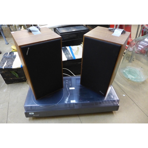 280 - A vintage Sharp music centre with a pair of matching speakers