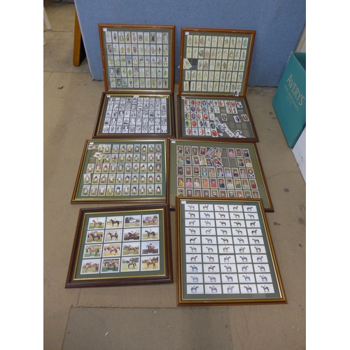 304 - Seven framed collections of cigarette cards including Derby and Grand National winners, etc.