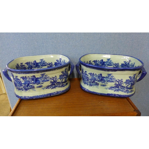 311 - A pair of porcelain footbath garden planters