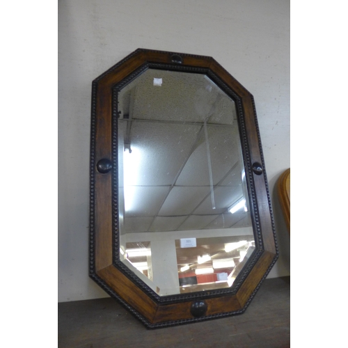 321 - An oak framed rectangular mirror