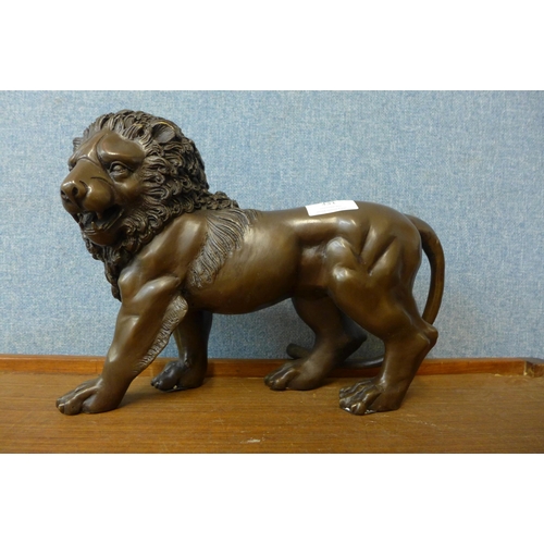 331 - A bronze figure of a lion