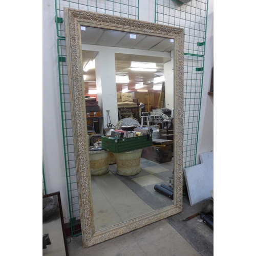 341 - A parcel gilt framed mirror