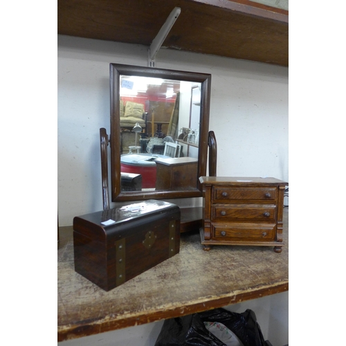 348 - An early 20th Century mahogany toilet mirror, miniature oak chest of drawers and a rosewood and bras... 