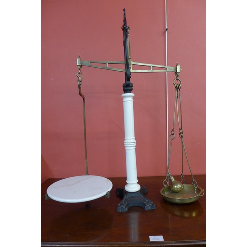 370 - A set of Victorian cast iron and porcelain balance scales