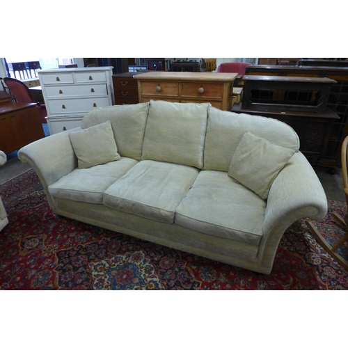 43 - A Duresta Harrington Hogarth two piece sand fabric lounge suite, comprising three seater settee and ... 