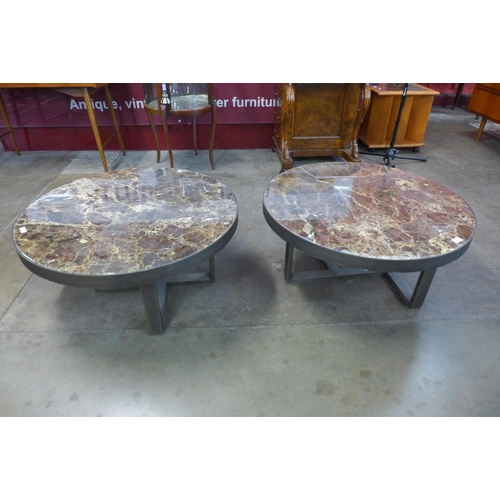 49 - A pair of contemporary Italian style marble topped circular coffee tables