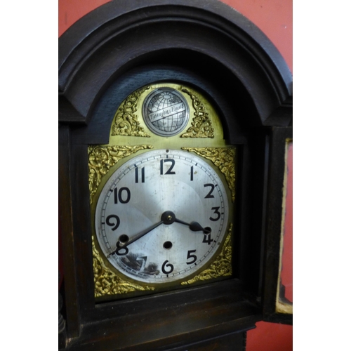 66 - An early 20th Century oak dwarf longcase clock