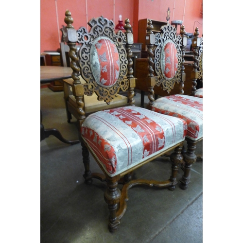 83 - A set of four Victorian carved mahogany and upholstered dining chairs