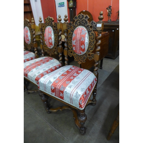 83 - A set of four Victorian carved mahogany and upholstered dining chairs