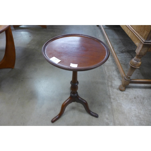 93 - An Edward VII mahogany tripod wine table