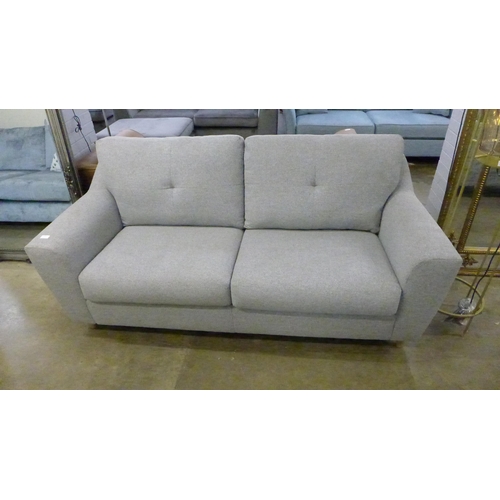 1334 - A grey upholstered two seater sofa