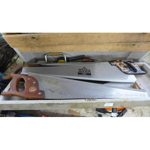 2025 - Carpenter's tool box with a quantity of saws and a few tools