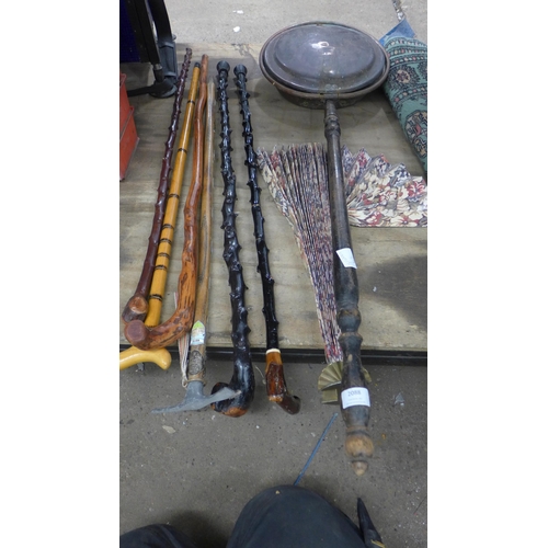 2088 - Quantity of walking sticks and canes plus a vintage bed pan and a decorative wall fan