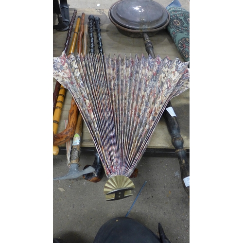 2088 - Quantity of walking sticks and canes plus a vintage bed pan and a decorative wall fan