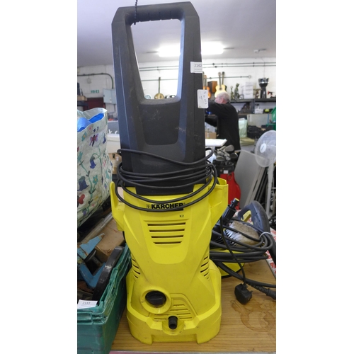 2142 - Karcher K2 pressure washer with  hose, lance, foam gun and patio cleaning attachments- W