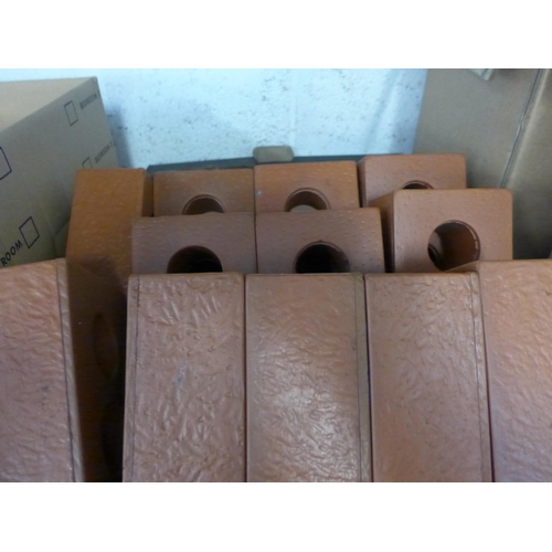 2210 - Box of 18 rubber bricks