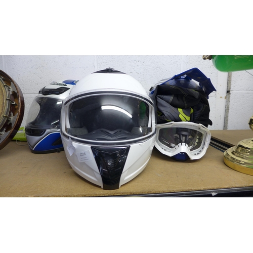 2216 - Three motorcycle crash helmets