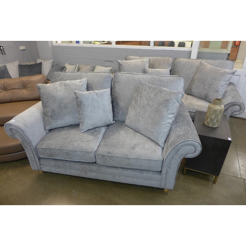 1301 - A pair of Mosta Adele steel upholstered sofas (3 + 2)