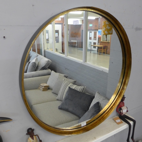 1311 - A large circular industrial style mirror