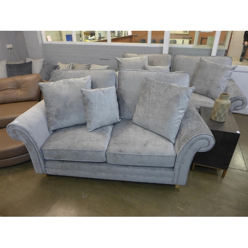 1315 - A pair of Mosta Adele steel upholstered sofas (3 + 2)