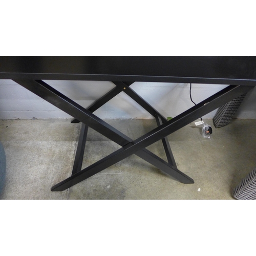 1323 - A black side table with cross legs