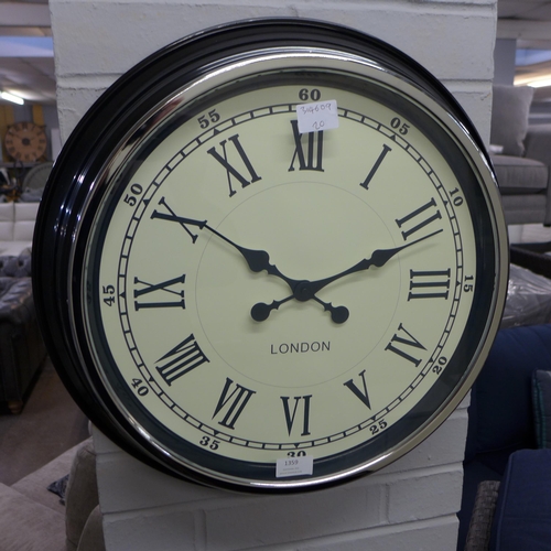 1359 - A black single dial clock