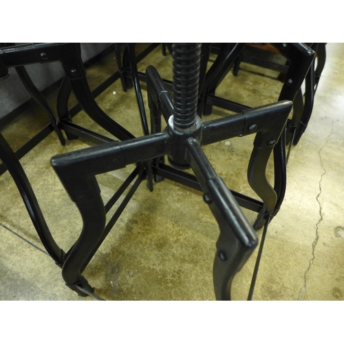 1393 - A set of six industrial style bar stools