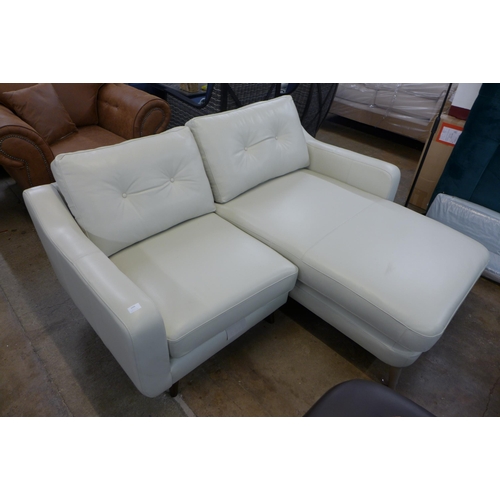 1396 - A cream leather button back RHF sofa/chaise - odd legs