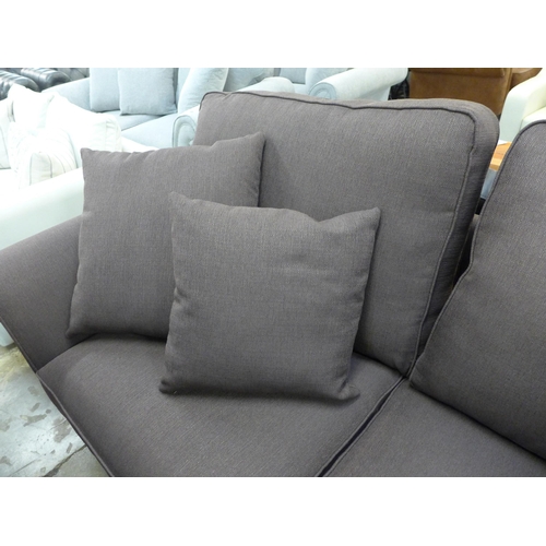 1400 - A pair of Mosta Aosta chocolate upholstered sofas (3 + 2)