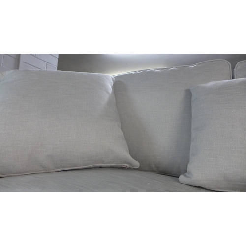 1402 - A pair of Mosta straw silver upholstered sofas (3 + 2)