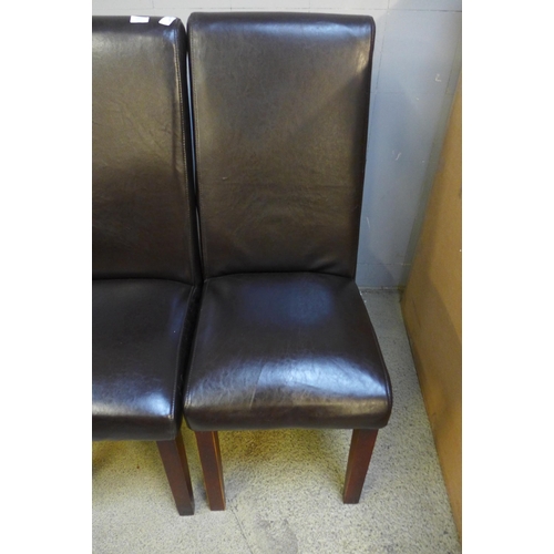 1481 - A set of four brown leather dining chairs