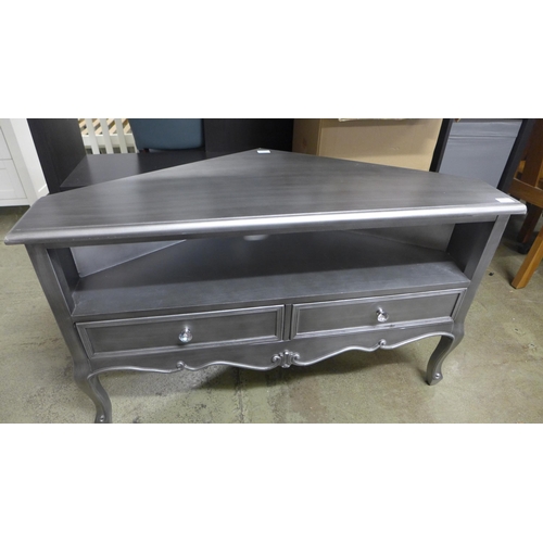 1494 - A silver two drawer corner media unit