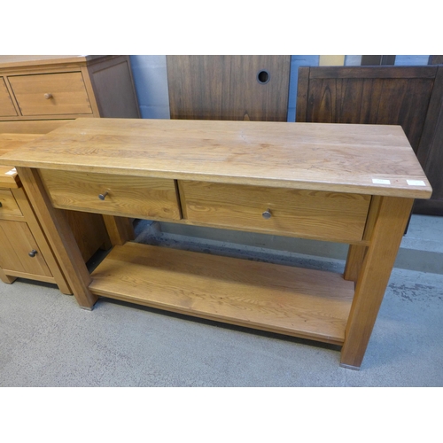 1512 - An oak two drawer console table