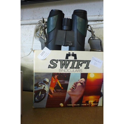 2251 - Boxed Swift 8 x 30 binoculars and pair of water resistant 8 x 30 action binoculars