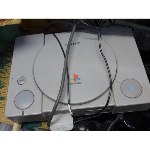 2263 - Playstation 1 and job lot: 4 consoles, controllers and approx. 60 mixed games