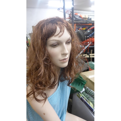 2340 - Sitting female shop mannequin