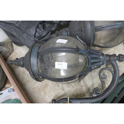 2430 - Two cast metal lantern exterior lights