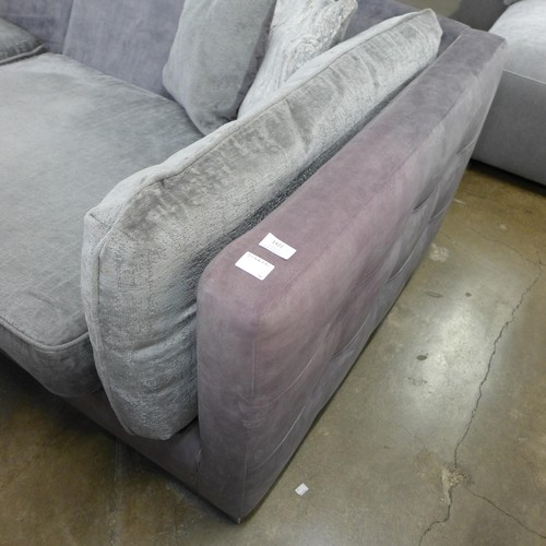 1422 - A Vivian two tone silver velvet four seater sofa - sun damaged