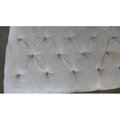 1367 - A cream velvet buttoned footstool