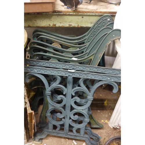 2431 - 2 sets of cast metal bench ends with pair of table ends