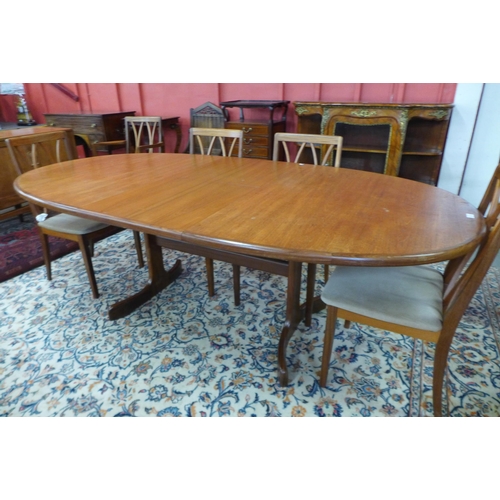 28 - A G-Plan Fresco teak extending dining table and eight chairs