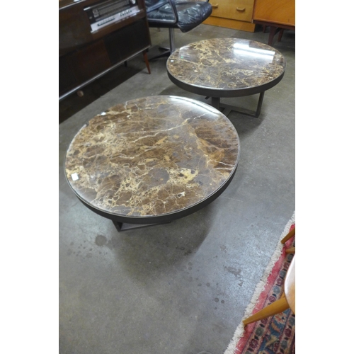 133 - A pair of contemporary Italian style marble topped circular coffee tables